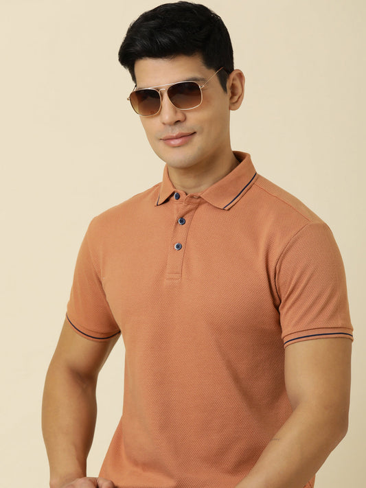 Men Solid Polo Neck Light Rust T-Shirt